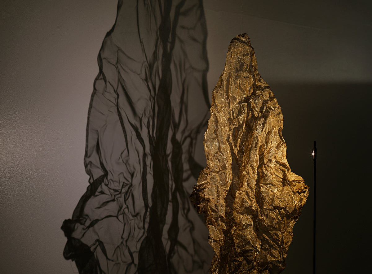Catellani & Smith Shadow Floor Lamp, close up of the lit net