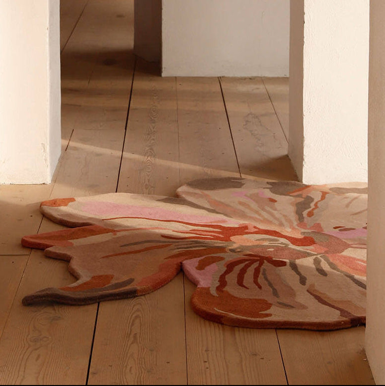 Nani Marquina Flora rugs by Santi Moix in a hallway